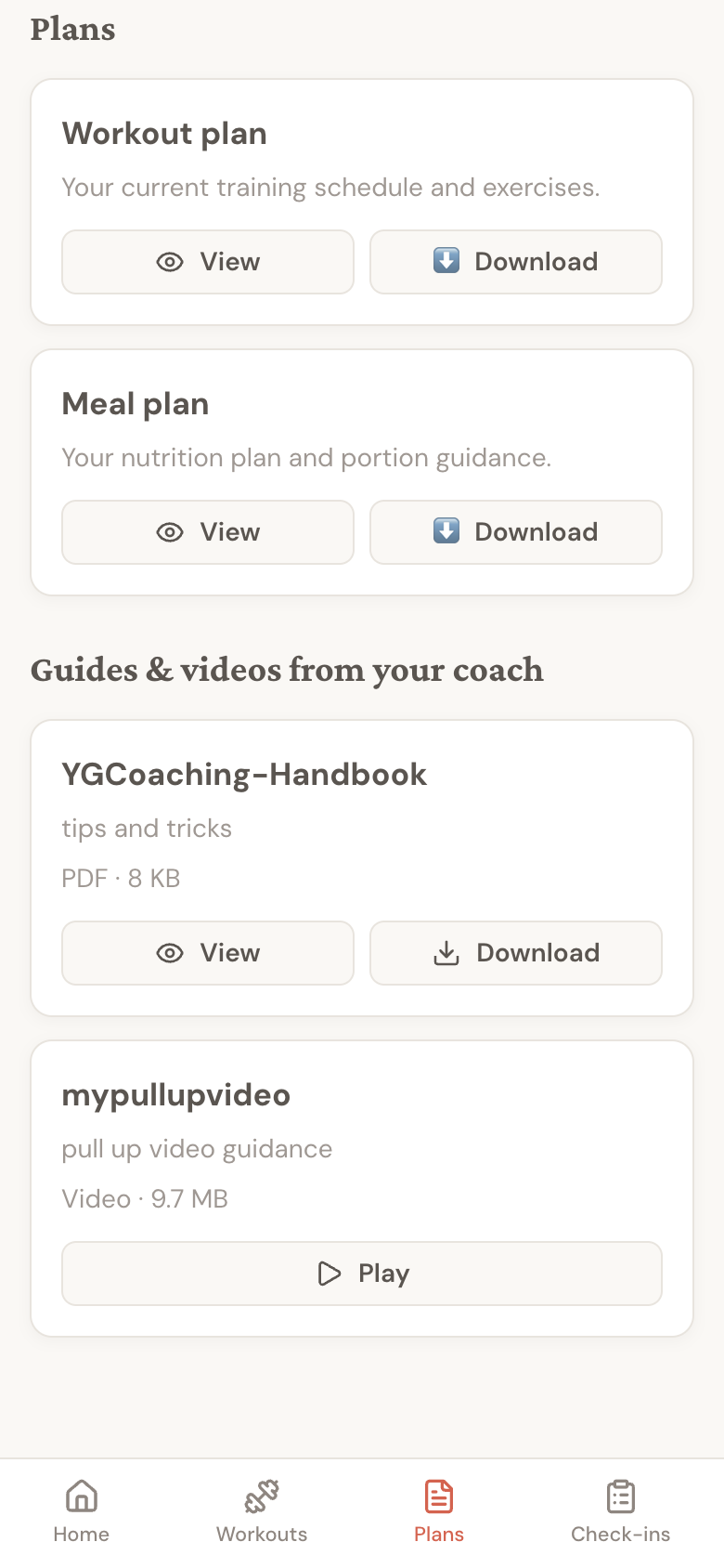 Plans tab showing coach-shared guides and videos below the workout and meal plan cards